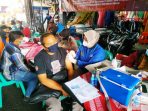 Gerai Vaksin Presisi Keliling Polres Tasikmalaya Kota di Pasar Cikurubuk