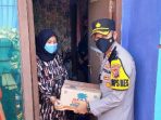 Bantu Warga Terdampak Pandemi Dan PPKM, Polisi Bagikan Bansos Sembako