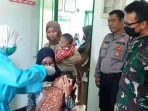 Kabid Humas Polda Jabar : Sinergitas Bhabinkamtibmas Dan Babinsa Pantau Imunisasi Polio Di Posyandu