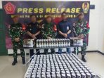 Anggota TNI Satgas Pamtas Gagalkan Penyelundupan 240 Kaleng Miras Ilegal
